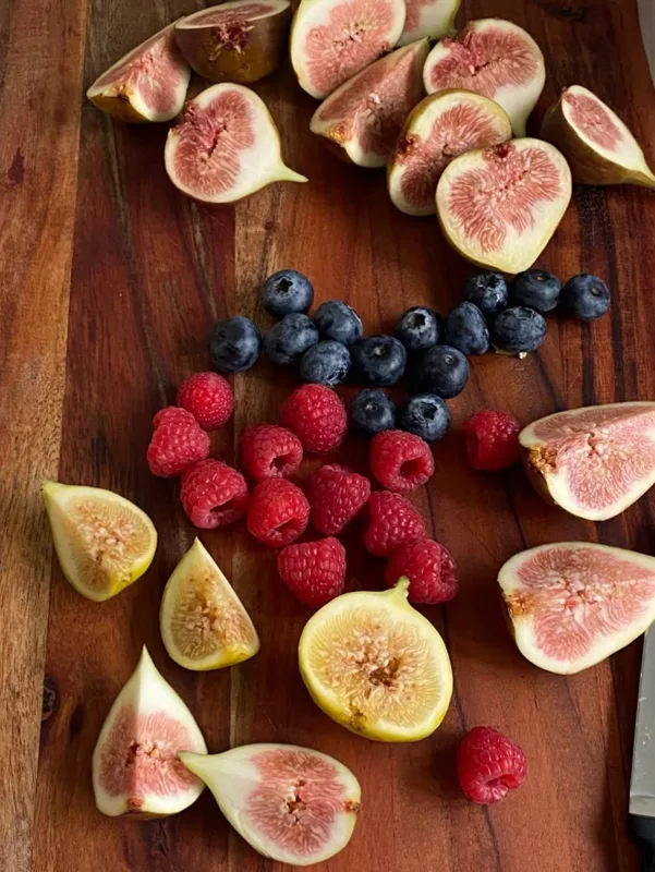 Fresh figs and berries, cut and ready